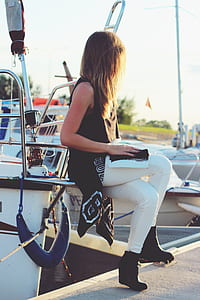 Girl sitting on the boat