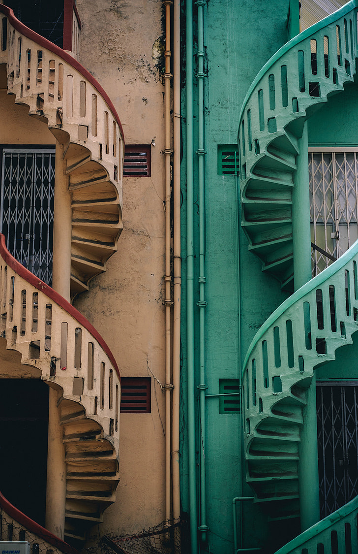 photo of brown and teal twirl stairs