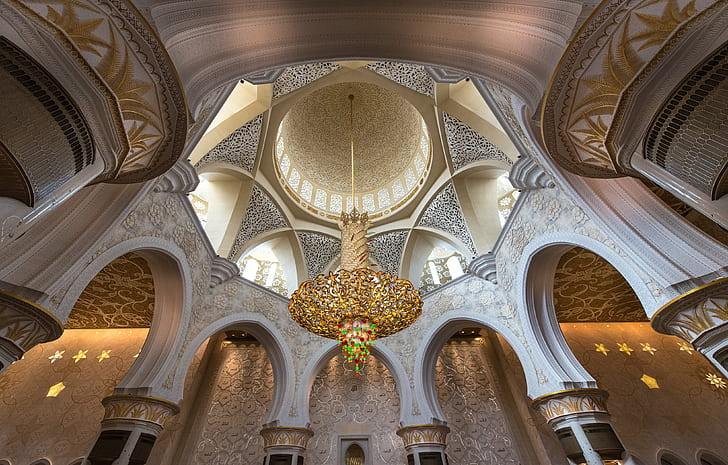 gold-colored chandelier inside room