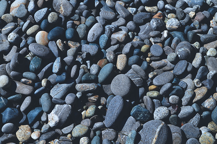 Overhead shot of pebbles on the beach