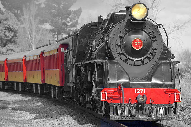 selective color photography of black and red train
