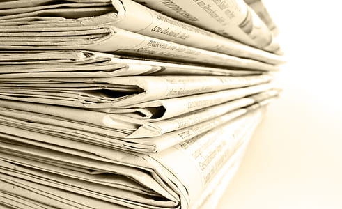 close-up photo of newspapers