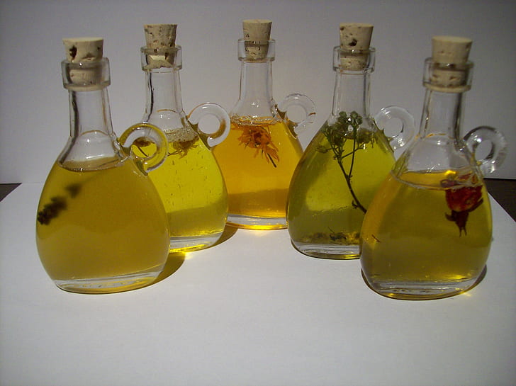photo of five olive oil bottles