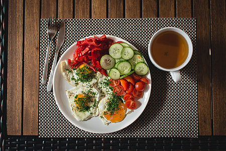 Paleo breakfast eggs with vegetables outside