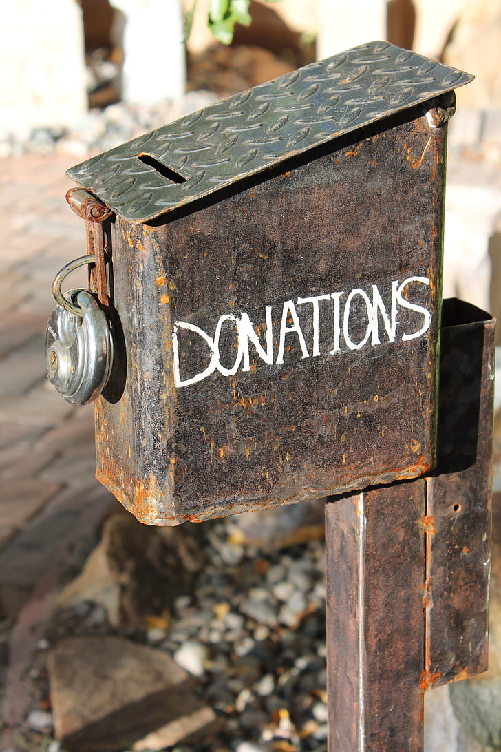 brown metal donations box