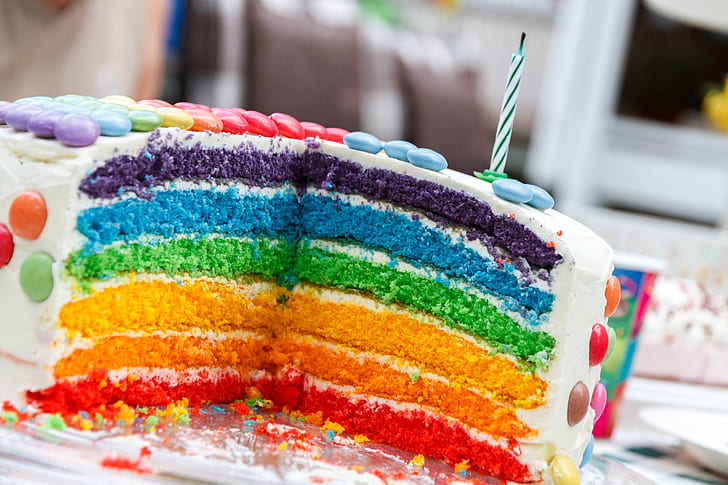 rainbow cake with white icing