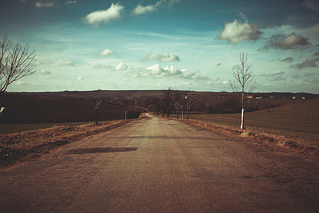 grey road during daytime