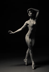 woman ballet dancing in grayscale photography