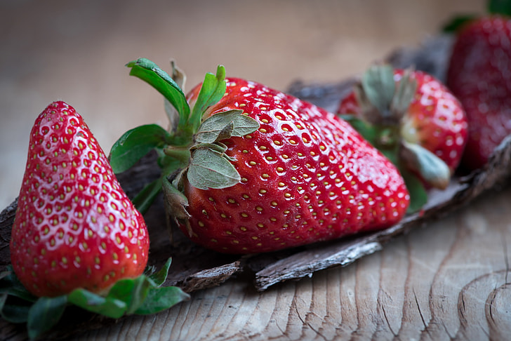 selective photography of strawberry fruit