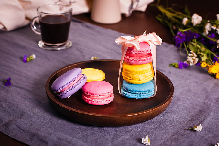 six macaroons served on plate