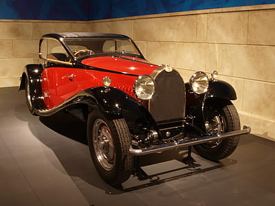 photo of classic red and black car