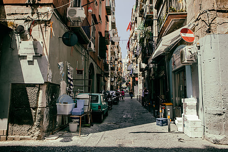 Street shot of the narrow streets of Old Naples (Centro Storico) in Italy. Image captured with a Canon 5D DSLR