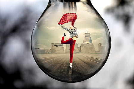 water drop photo of woman wearing red pants