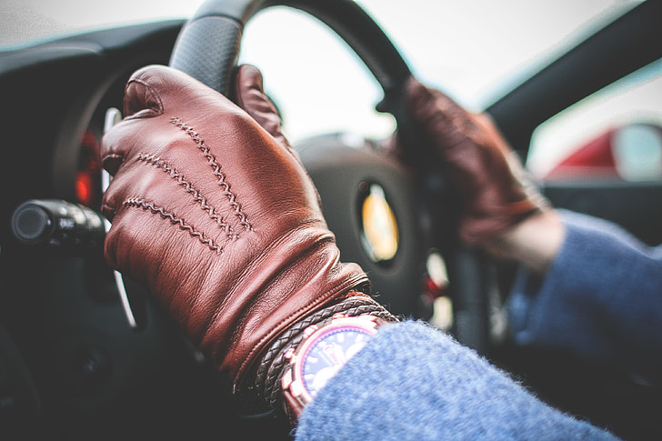 Driver with Brown Leather Driving Gloves