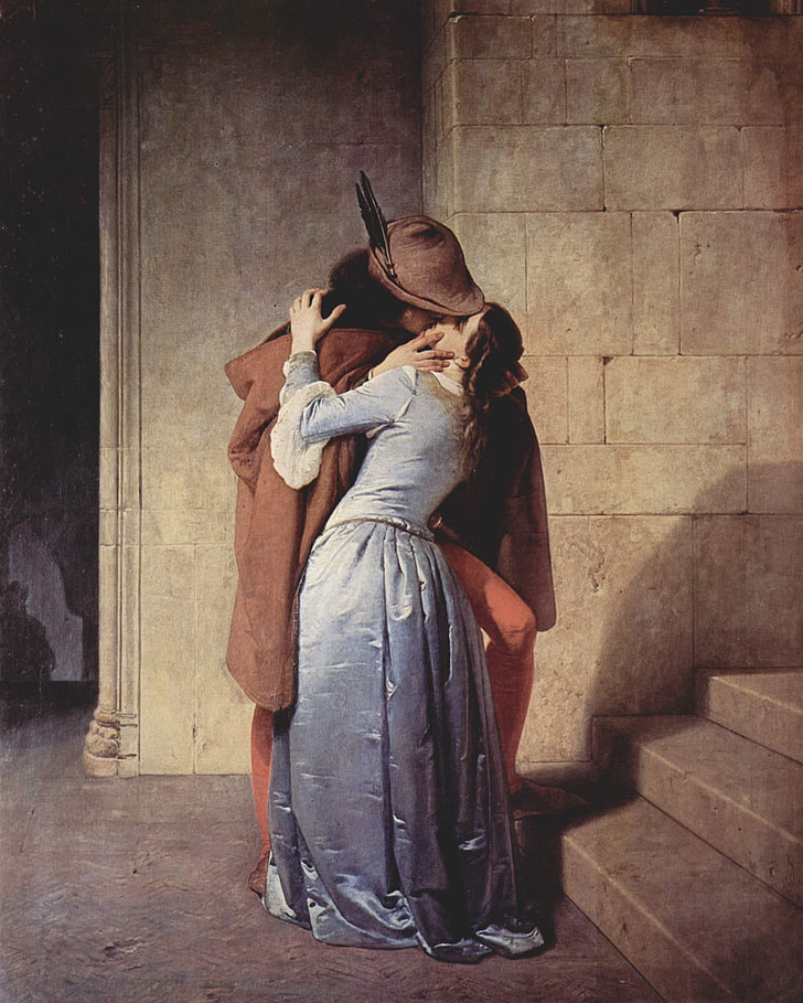 man and woman kissing beside staircase painting