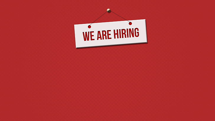 we are hiring wall plaque on red wall