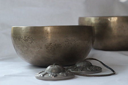 gold bowl on white surface