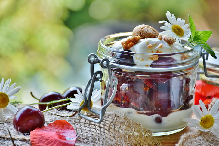ice cream dessert with grapes on clear glass clip on mason jar