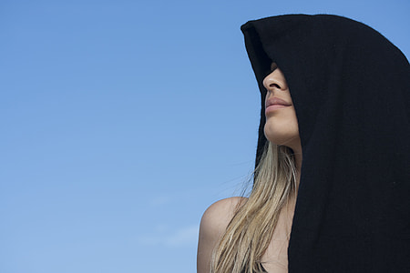 woman wearing black hoodie