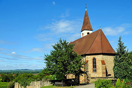 photo of brown and white church