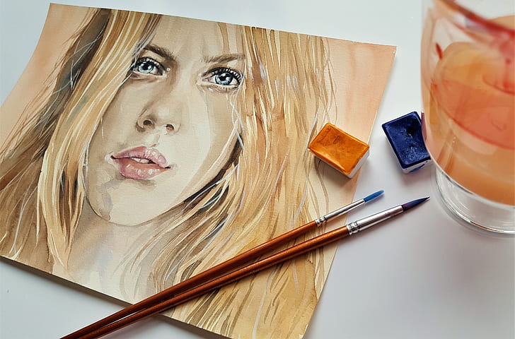 blonde haired woman painting
