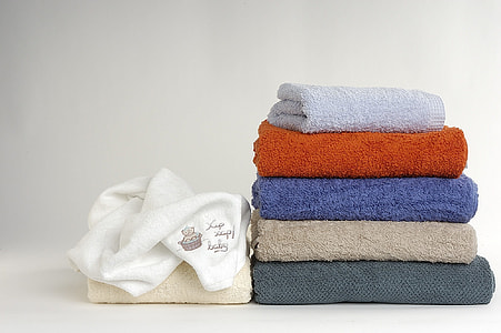 several assorted-color towels
