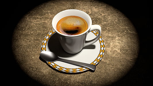 white and yellow ceramic cup with coffee illustration