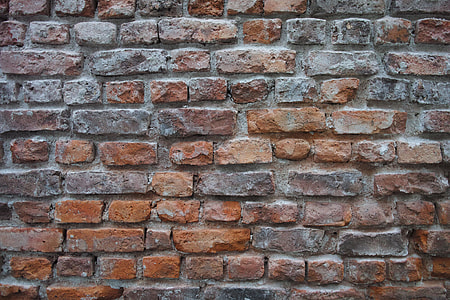 photo of brown and gray brick wall