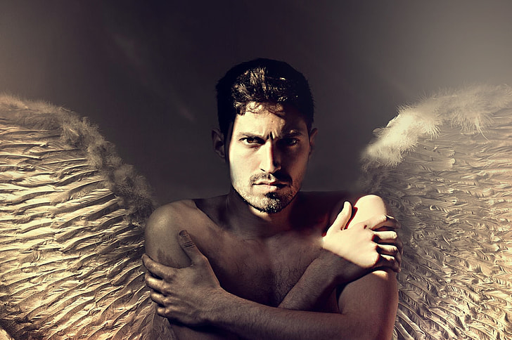 winged topless man