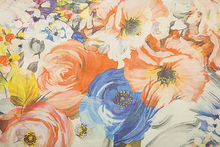close up photo of blue and orange floral painting