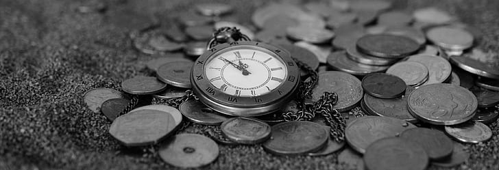 pocket watch on coins