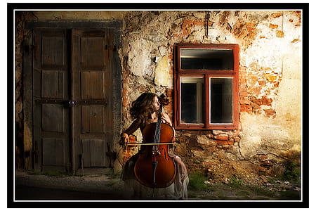 woman playing cello painting