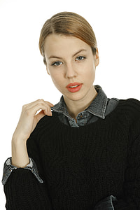 photo of woman wearing black sweater and denim collard top