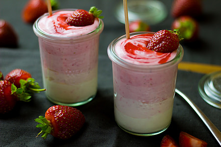 closeup photo of two strawberry ice creams