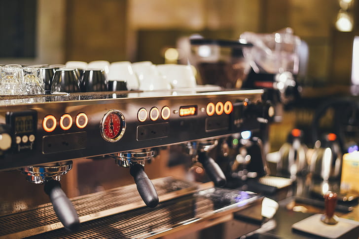 selective focus photo of gray espresso machine