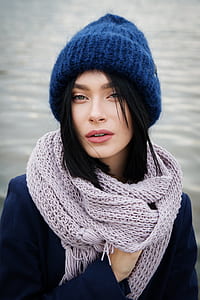 woman wearing blue knit hat