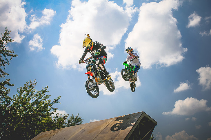 Two Crazy Jumping Pitbikers