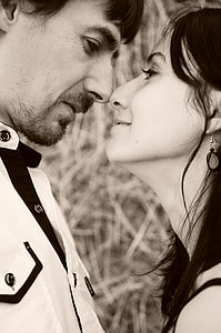 closeup photo of man and woman about to kiss