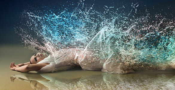 woman lying on floor with water effect painting