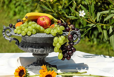assorted fruits on gray metal stemmed tray