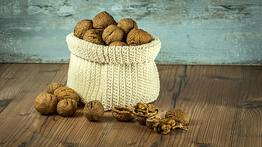 bunch of nuts in knitted basket