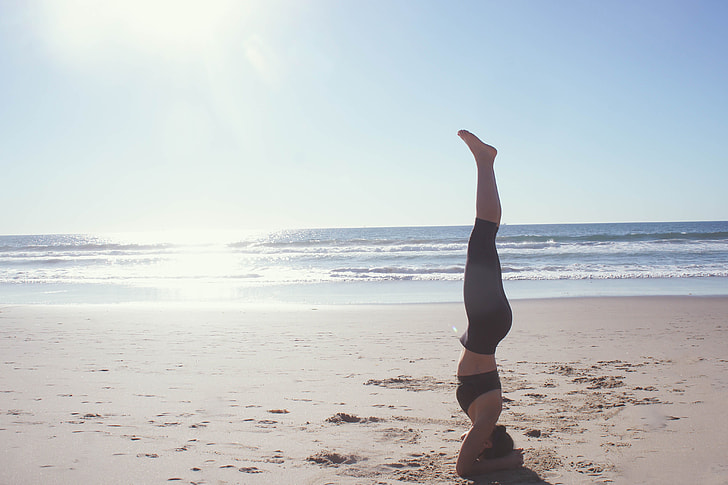 Yoga stand on beach
