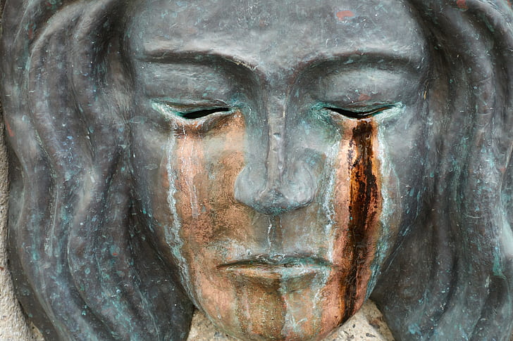 female statue's face