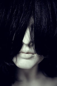 Woman Face Covered With Hair