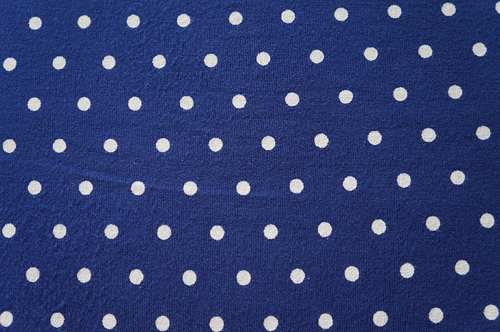 blue and white polka-dot textile
