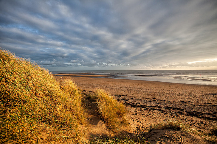 Landscape shot taken from the sand dunes at Camber Sands in East Sussex in the South of England