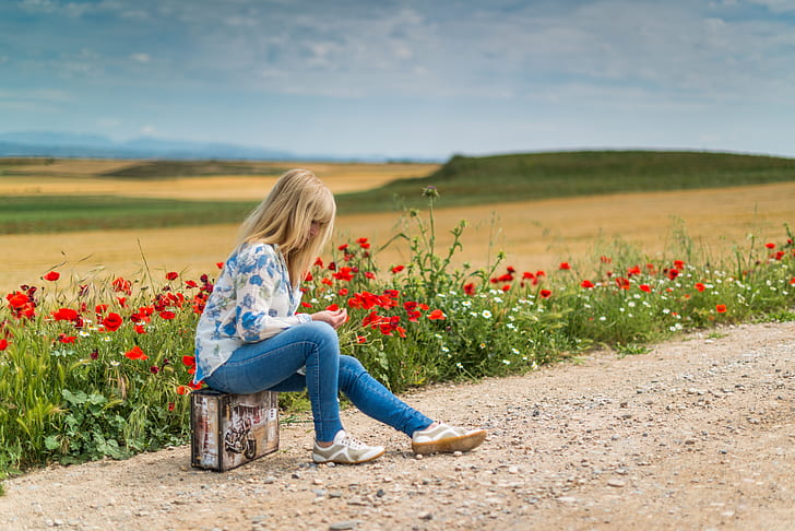 Girl Near Red Petal Flowers at Daytime