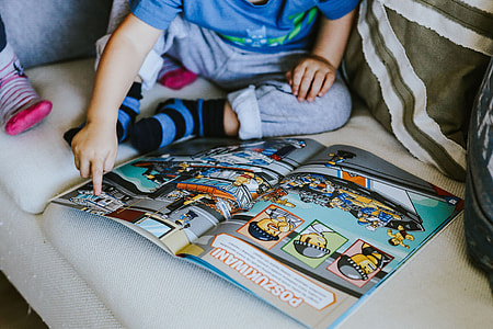 Child reading a comic story