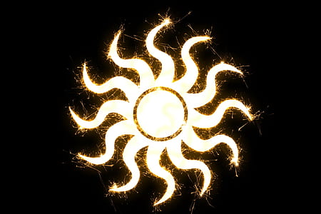 yellow sun logo on black background