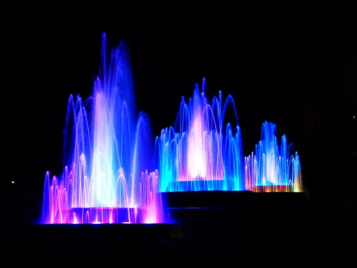 fountains with blue and purple lights